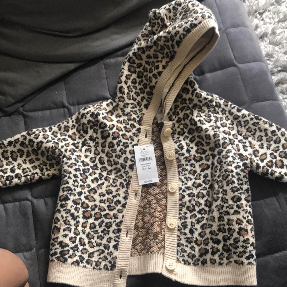 Brand new baby girl sweater with buttons and hood